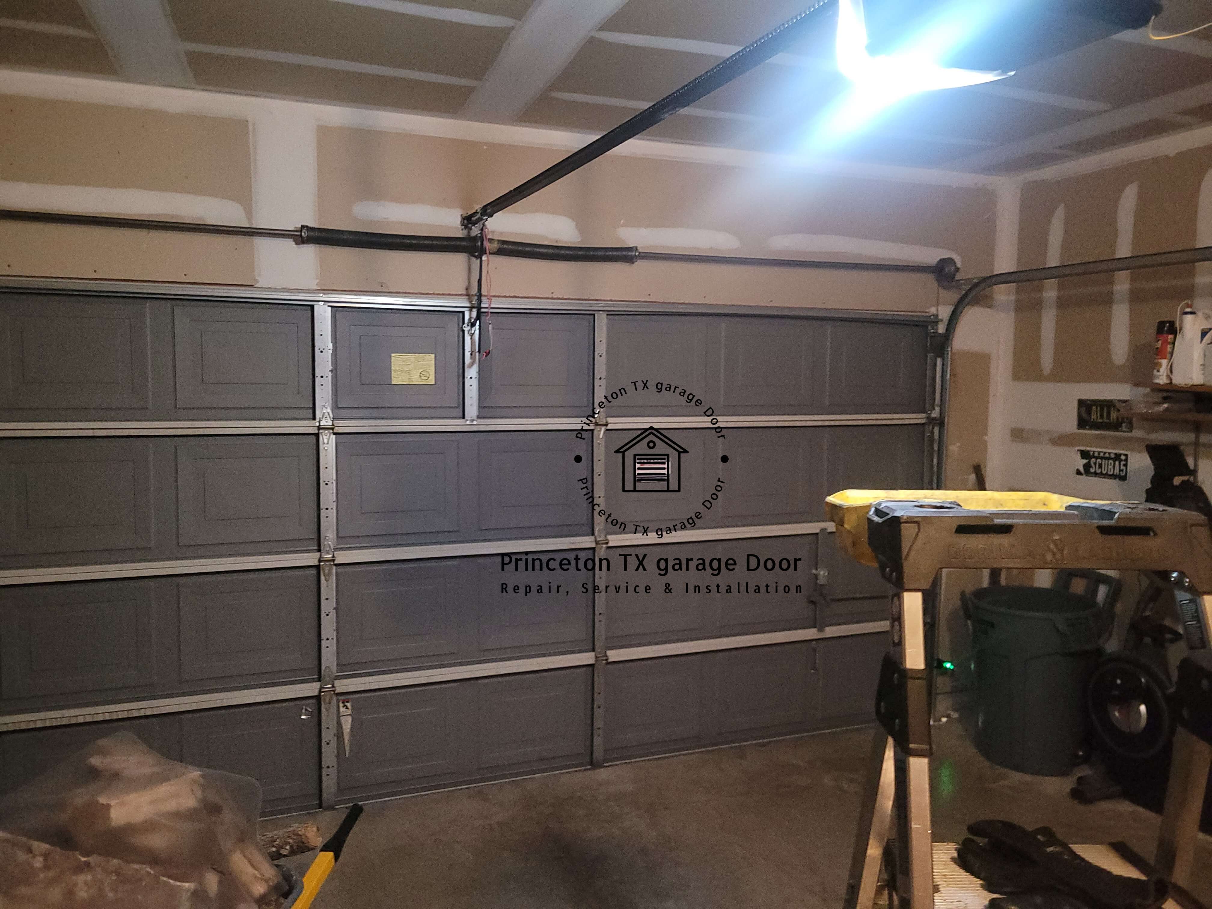 pan-garage-door-off-track-repair